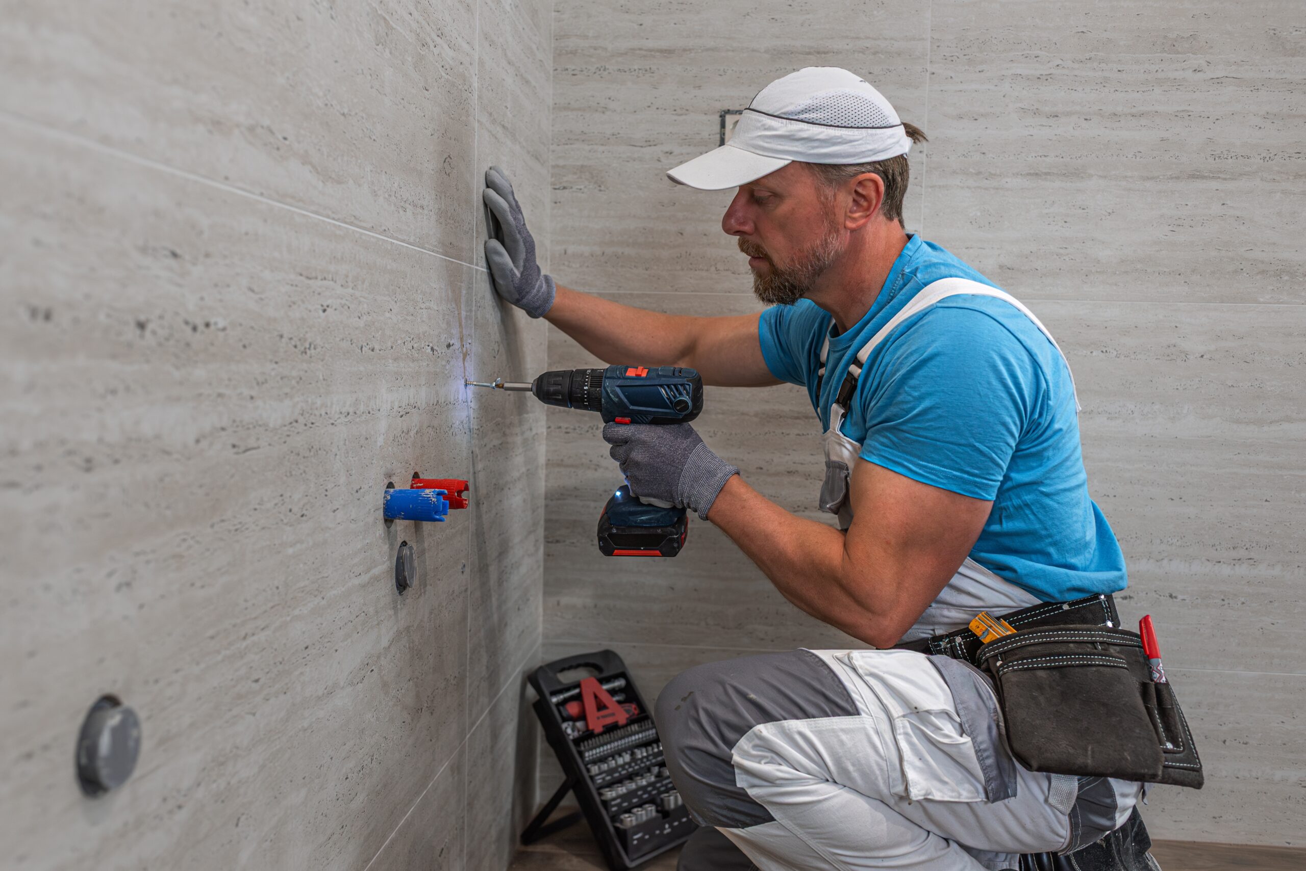 Installation,Of,Bathroom,Furniture.,The,Plumber,Is,Screw,The,Anchor